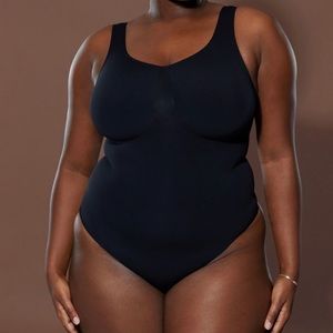 Yitty black thong body suit NWT